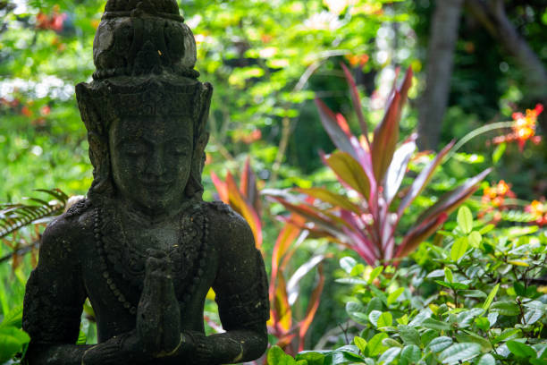istock Balinese statue in a garden 1653956881