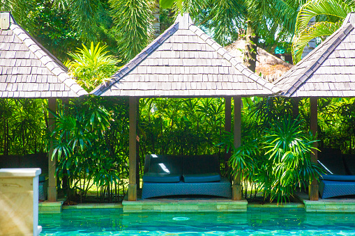 Beds by the resort pool for relaxation