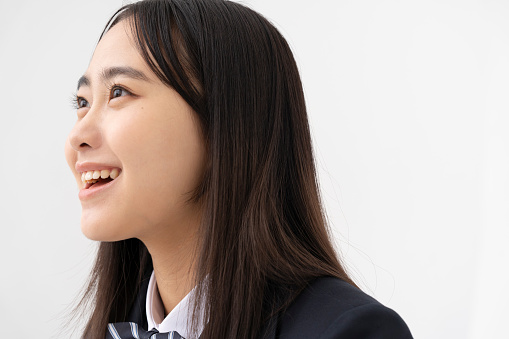 A portrait of a Japanese high school girl.