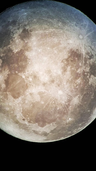 Photo of the full moon , zoon in surface from a telescope.