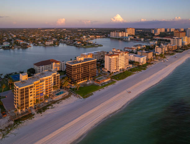 istock Aerial drone photo Naples Vanderbilt Beach Florida, at sunset 1654049992