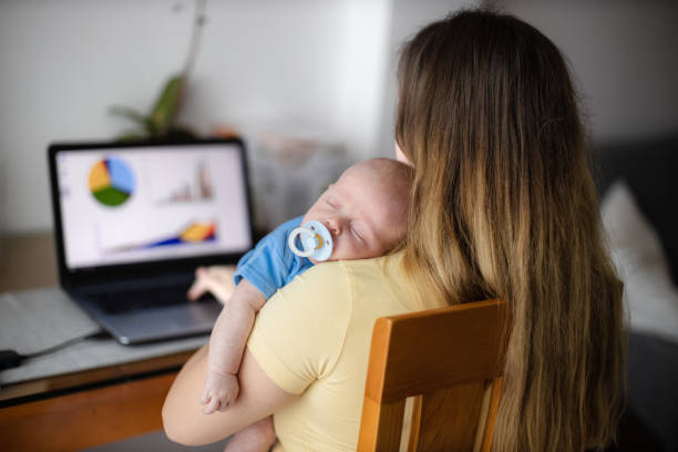 istock Young family with a newborn 1654076250