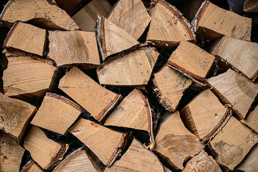 Heap of firewood, full frame background