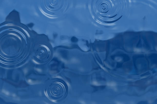 Rain drops on water