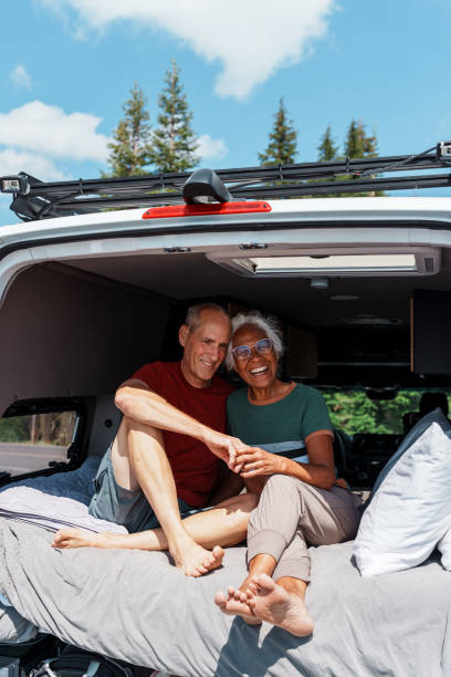 istock Adventurous senior couple in camper van 1654168026