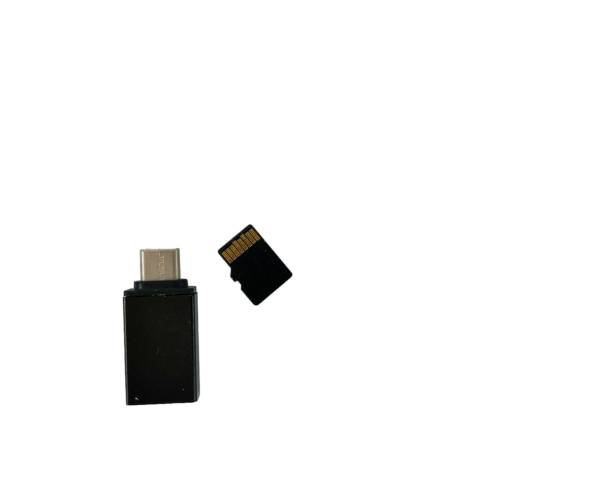 istock OTG with memory card isolated on white. 1654168362