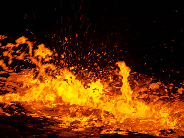 Erta Ale boiling Small eruption on Volcano Erta Ale, which has a long-lived active lava lake. It is on East African Rift in the Danakil desert, Ethiopia. danakil desert photos stock pictures, royalty-free photos & images