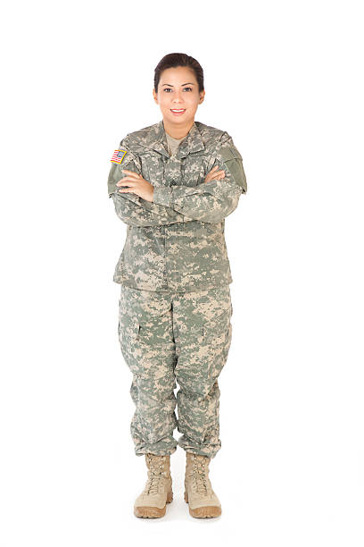 Female American Soldier in Army Camouflage uniform Female American soldier in army camouflage uniform. military deployment photos stock pictures, royalty-free photos & images