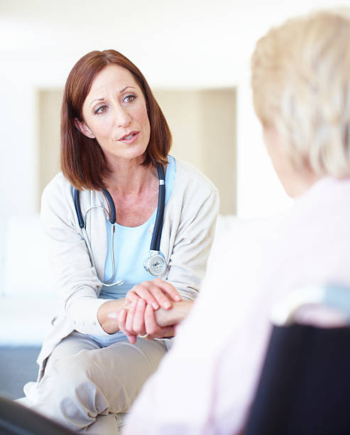 istock She takes her patient's concerns to heart 165419125
