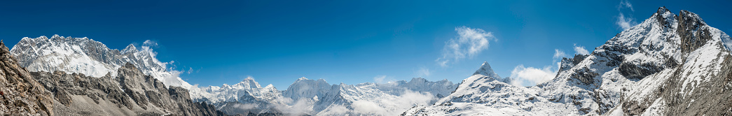 Mountain peaks of Italian Alps isolated on white background. Brenta Dolomites (Dolomiti di Brenta) seen from the Lake Tovel (Lago di Tovel). National Park of Adamello Brenta. Trentino Alto Adige, Trento province, Italy, Europe.