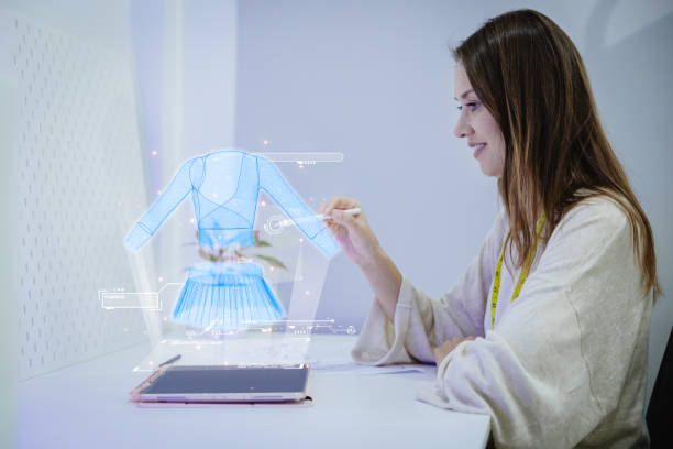 istock Costume fashion clothing designer using 3D hologram VR visual digital design technology in tailor studio 1654227470