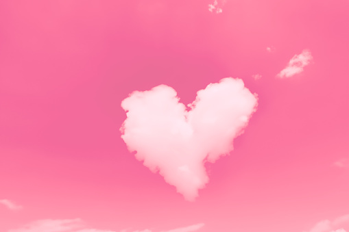 Heart shape cloud in pink color sky for valentine day sweet love romantic nature background