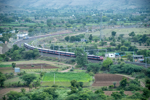 Pune, India - August 15 2023: A local DMU commuter train at Shindawane near Pune India.