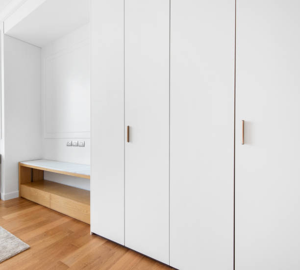 istock Modern white built-in wardrobe of bedroom interior 1654248185