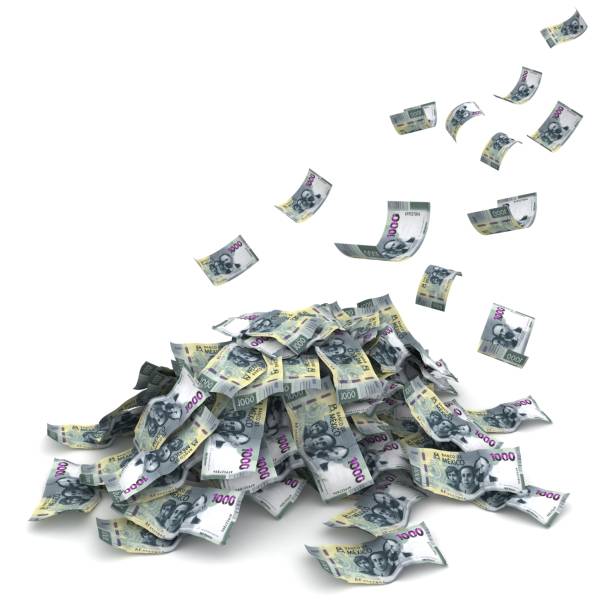 istock Mexican money peso falling finance crisis 1654294419