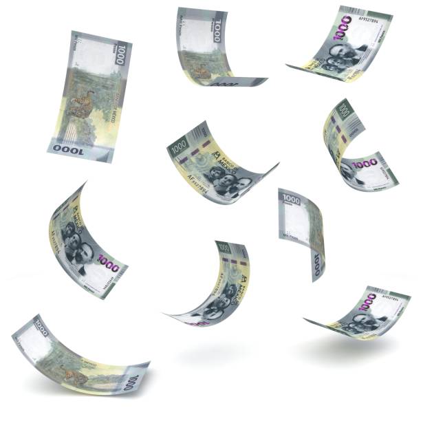 istock Mexican money peso falling finance crisis 1654294938
