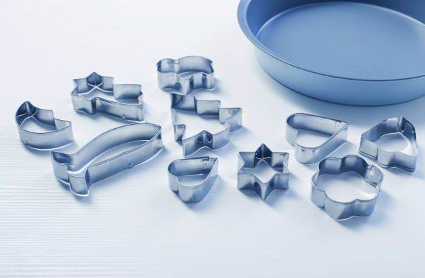 istock metal cookie cutters and metal baking sheet 1654330370