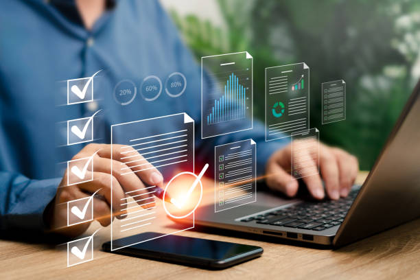 istock Businessman checklist on electronic digital documents concept, Businessman checklist and approve smart document on virtual screen modern and efficient document management communication technology 1654355869