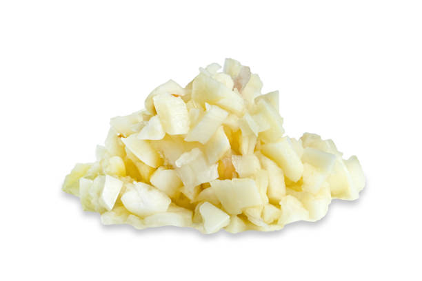 istock chopped peeled garlic isolated on white background 1654392419