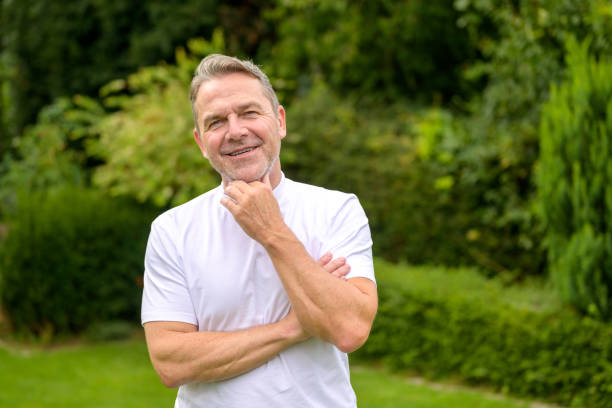 istock Attractive man having one hand on his chin 1654438920