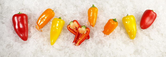 Fish and Seafood - Various Mini Peppers on Ice with white Background - Vegetables Panorama