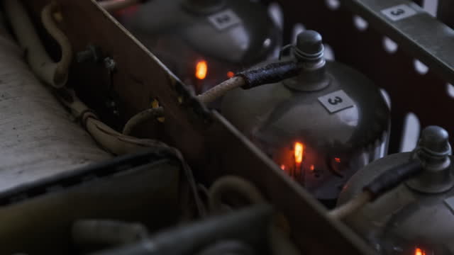 Radio Tubes Glowing Inside a Homemade Sound Amplifier