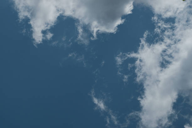 istock Blue sky and white clouds.  Selective focus. Out of focus. Copy space 1654518689