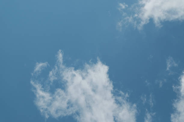 istock Blue sky and white clouds.  Selective focus. Out of focus. Copy space 1654519221