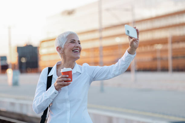 istock Modern senior woman using phone 1654522685