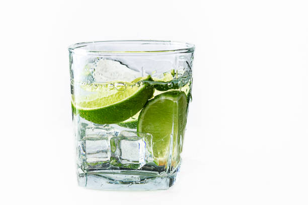 istock A glass of water with lime and ice on a white background. 1654524109