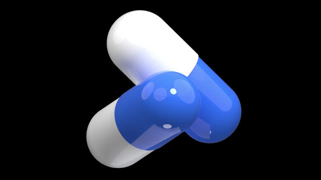 3d white and blue pill. 3d rendering capsule pill. Blue medical pill. Seamless and looped animation. Transparent background with alpha channel