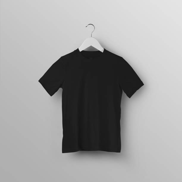 istock Black children's t-shirt mockup on a hanger, front view, isolated on background. 1654524615