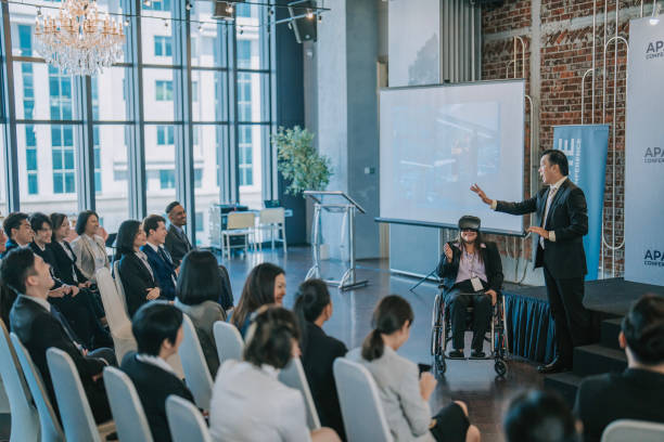 istock Asian Entrepreneur explaining demonstrate to business conference participants on VR google functionality  in workshop 1654535352