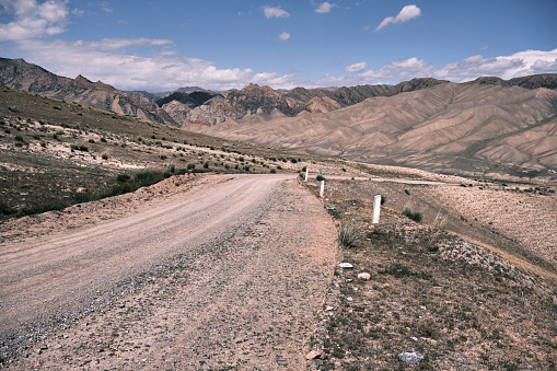 Rocky road through mountain pass (Naryn region, Kyrgyzstan)