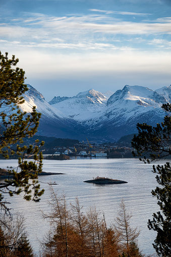 A small hike from the Sunnmøre Open Air Museum in Ålesund you'll find a beautiful panoramic view towards the Sunnmøre Alps. Taken in March 2023, Ålesund, Norway