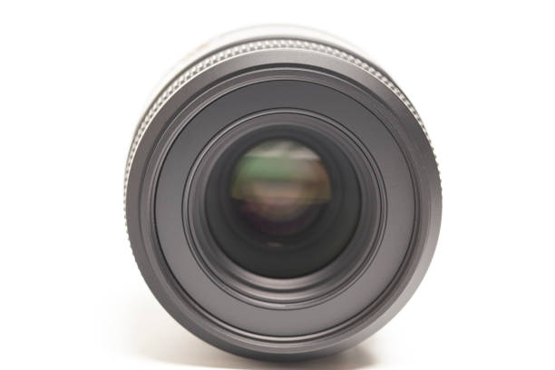 istock Camera photo lens macro isolated on white background 1654637866