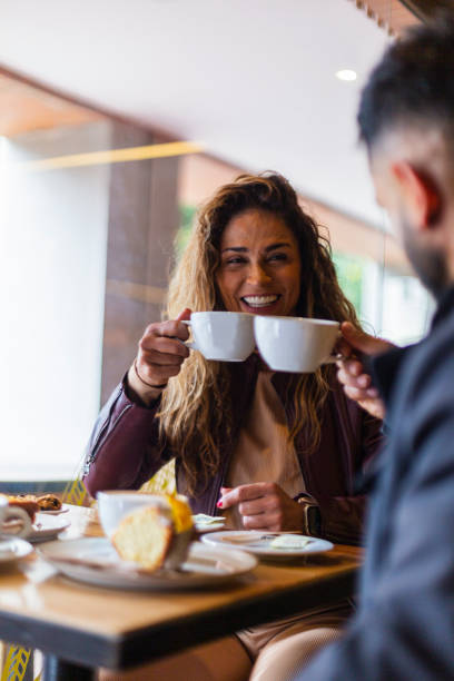istock Couple enjoying a good conversation while waiting for their order at the coffee shop 1654695584