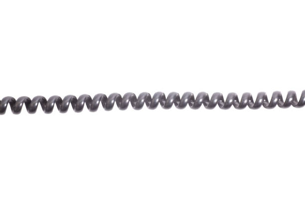 istock Black spiral telephone cord isolated on white background 1654725566