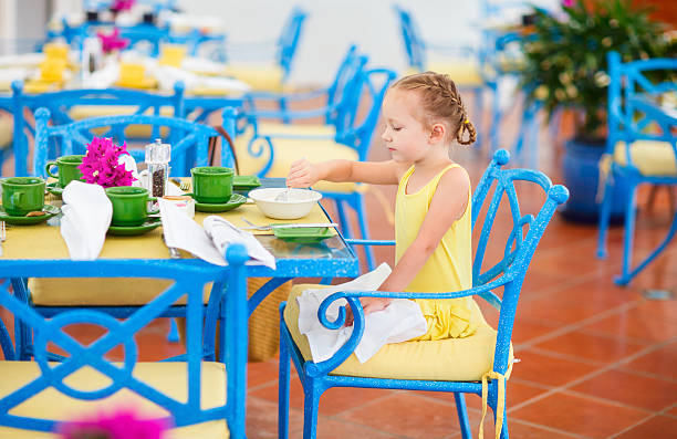 istock Little girl having breakfast 165475748