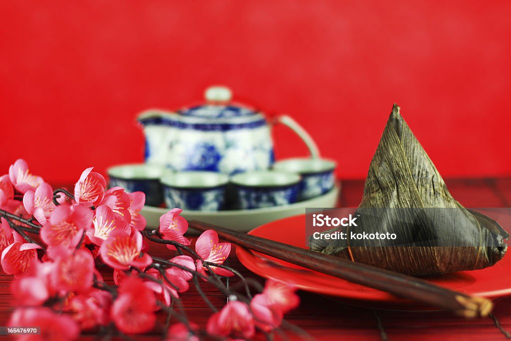 Rice dumpling pyramid-shaped dumplings made by wrapping glutinous rice in bamboo leaves Chinese Tea Stock Photo