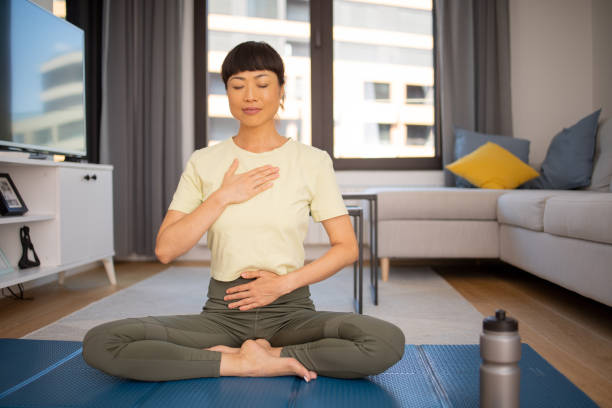 istock Young woman at home keeping fit by exercising 1654796911