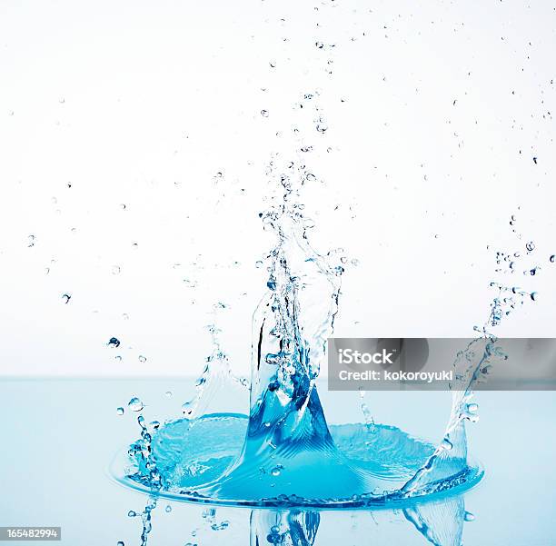 Agua Splash Foto de stock y más banco de imágenes de Agua - Agua, Azul, Azul turquesa