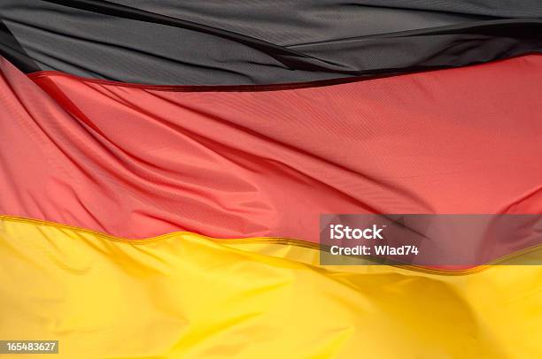 Fragmento Da Bandeira Da Alemanha Na Luz Solar - Fotografias de stock e mais imagens de Alemanha - Alemanha, Amarelo, Bandeira