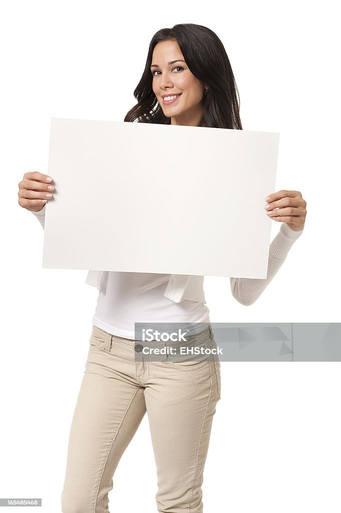 Casual Young Woman with Sign Isolated on White Background Casual Young Woman with Sign Isolated on White Background  Adult Stock Photo