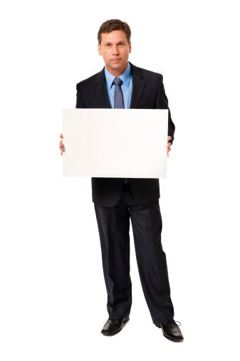 Businessman Holding Blank Sign Isolated on White Background