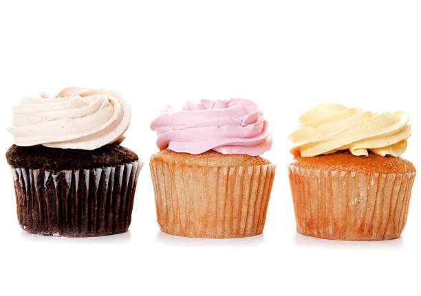 istock Stacks of Gourmet Cupcakes, Desserts With Icing 165487871