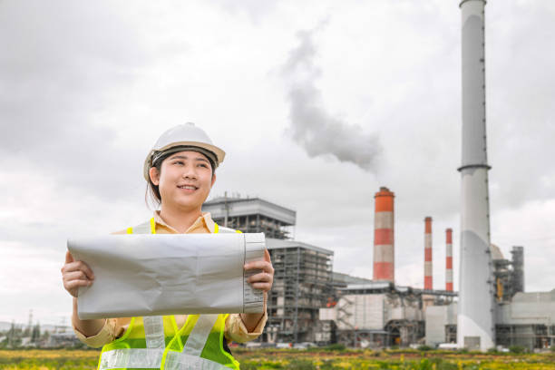 istock Engineer woman worker with floor plan industry construction designer project manager looking site field working 1654916771