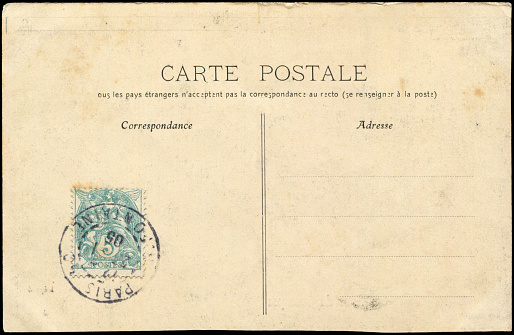 a vintage blank postcard sent from Paris, France in 1900s,  ready for any usage of  historic events background related to mail delievery description.