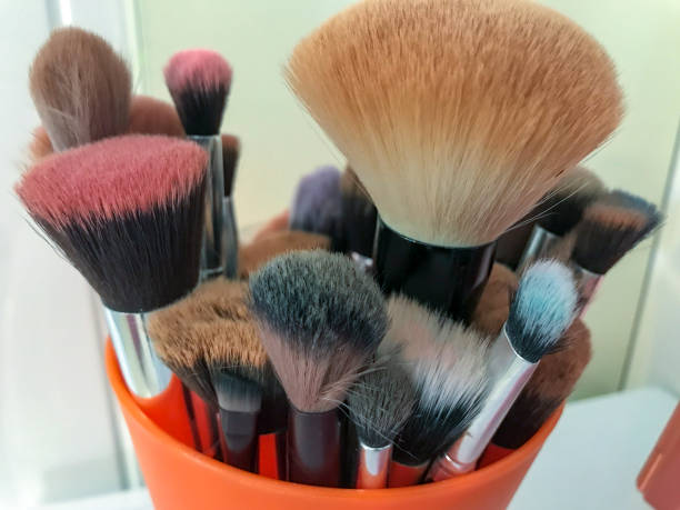 istock various brushes used for make-up in various shapes, sizes and colours 1654919034