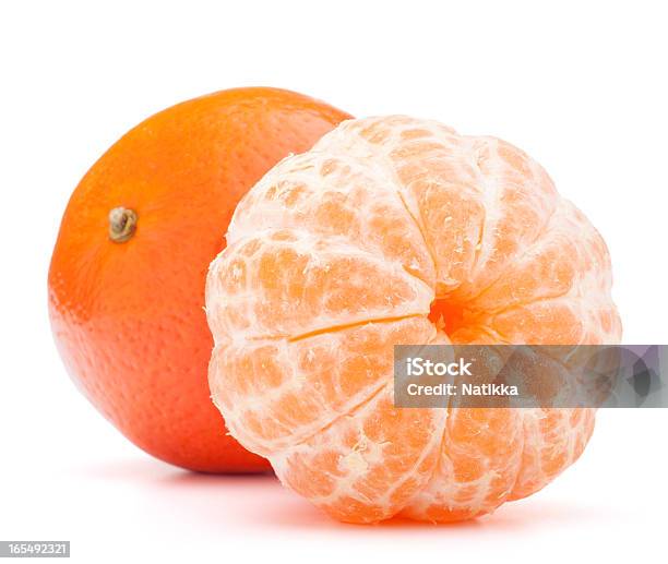 Foto de Tangerine Ou Mandarin Frutas e mais fotos de stock de Comida - Comida, Descascado, Dois Objetos